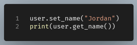 Python example showing traditional getter and setter methods used to change and retrieve a user’s name.